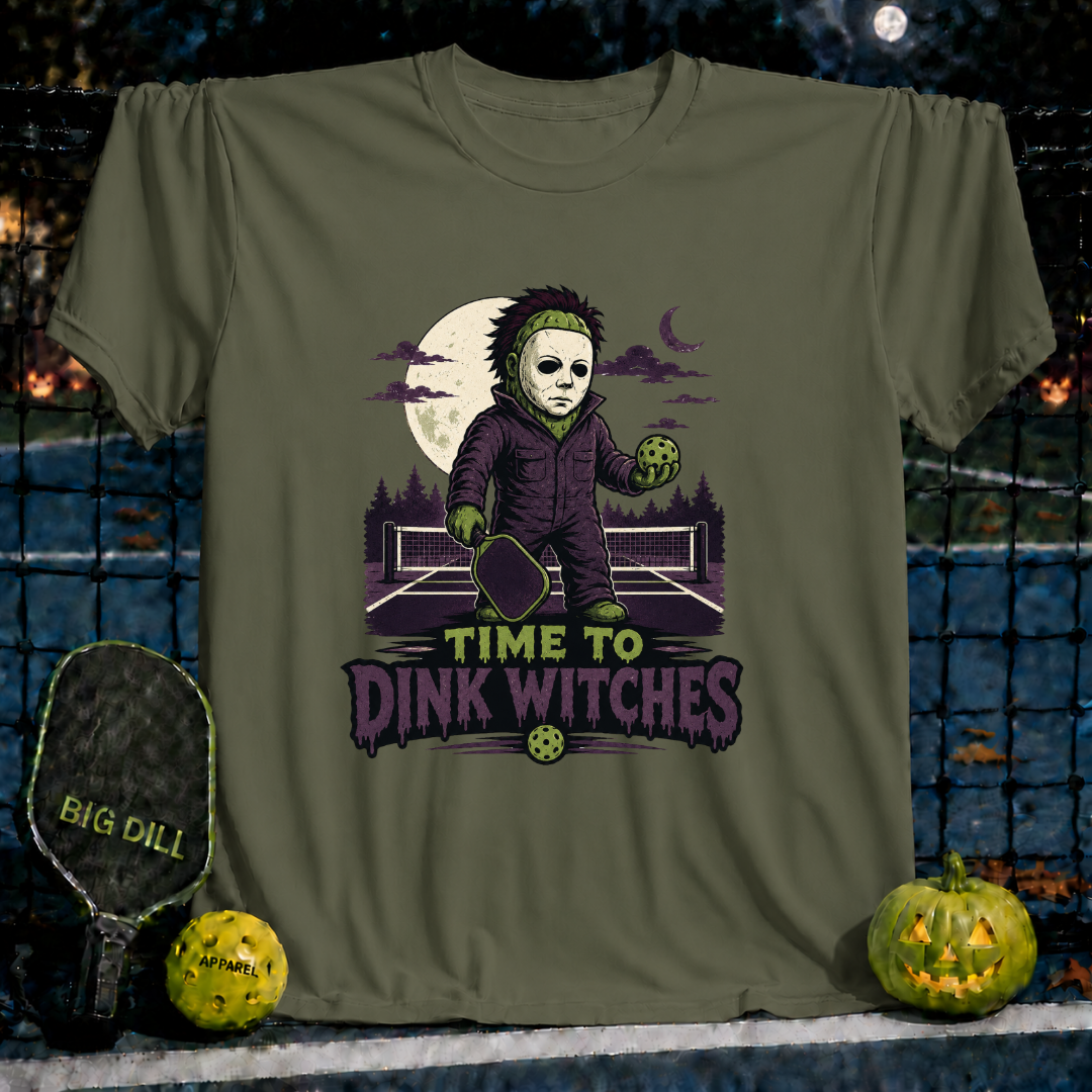 Military green unisex pickleball t-shirt featuring a spooky Halloween graphic with a masked player and Time to Dink Witches text.