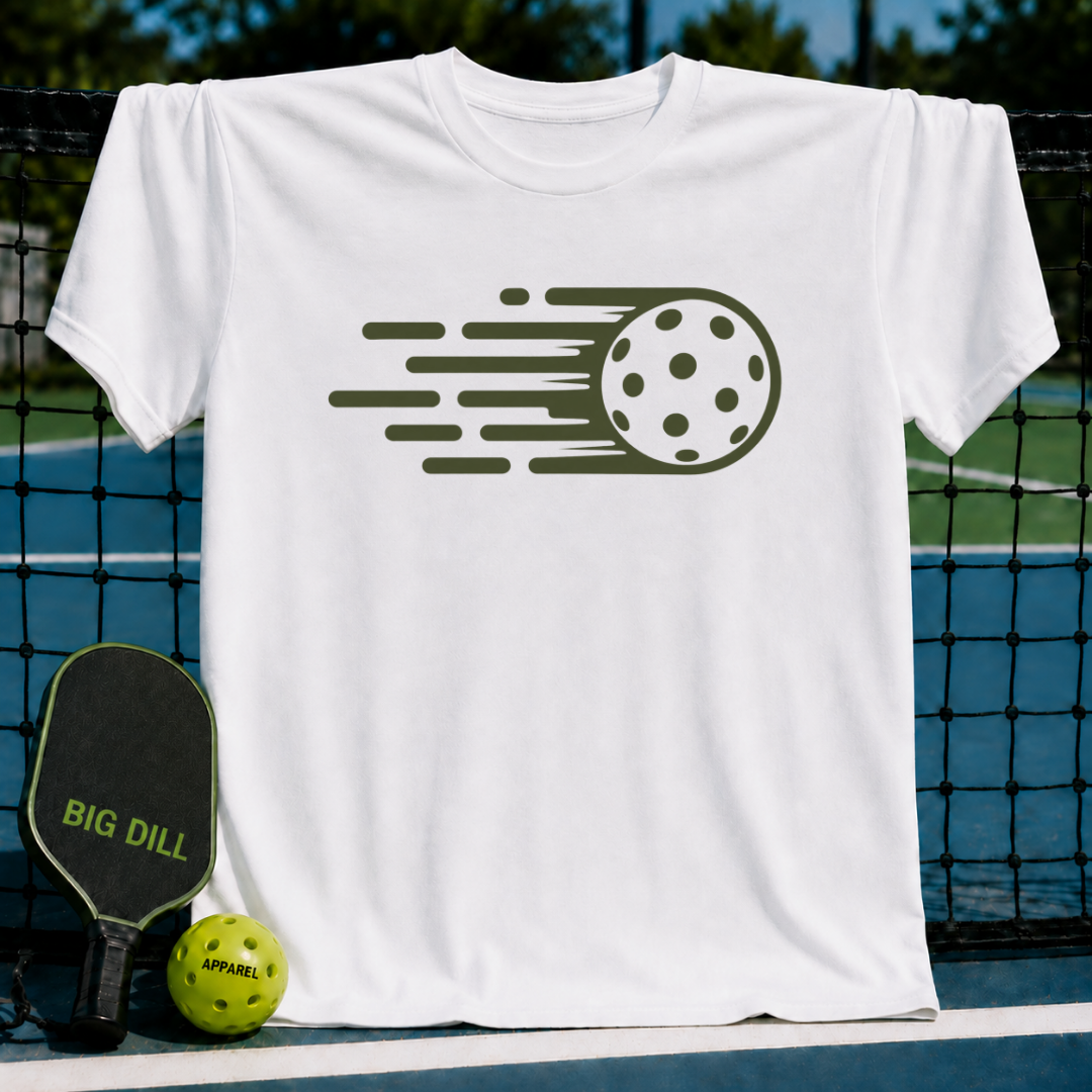 White unisex Hyper Dink t-shirt featuring a dark green motion-line pickleball graphic, displayed on a pickleball court.