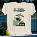 Cream-colored cotton t-shirt featuring a pickleball graphic with glasses, a paddle, a ball, and the text Vision 20/OUT.