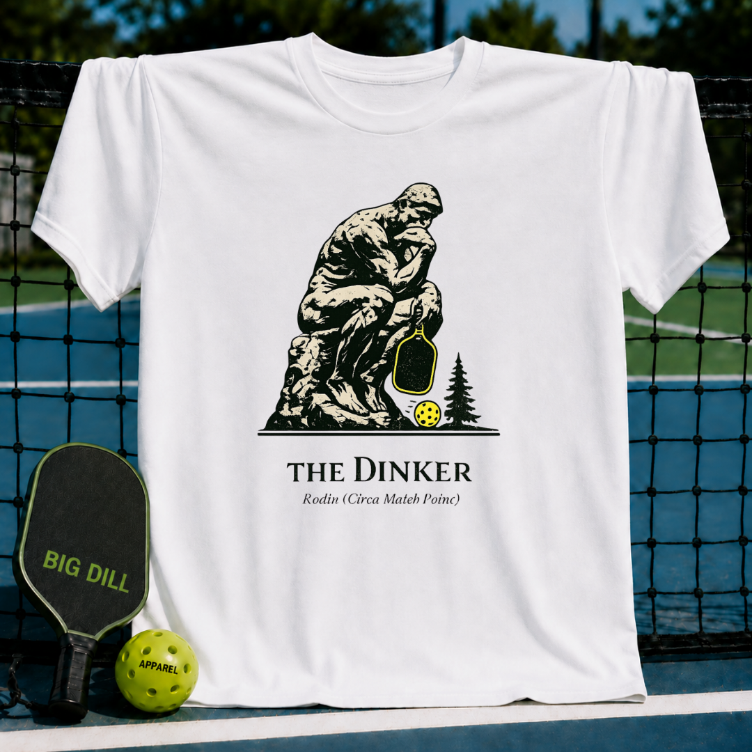 White unisex t-shirt featuring The Thinker holding a pickleball paddle with a neon yellow ball and The Dinker text.