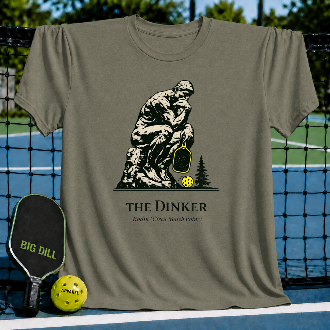 Olive green unisex t-shirt featuring The Thinker holding a pickleball paddle and neon ball with The Dinker text.